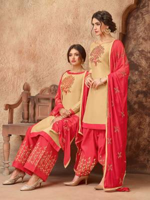 Simple And elegant Looking Straight Suit Is Here In Beige Colored Top Paired With Fuschia Pink Colored Bottom And Dupatta. This Dress Material Is Cotton Based Paired With Chiffon Fabricated Dupatta. Get This Stitched As A Plazzo Or Salwar As Per Your Desired Comfort. 