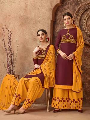 Beat The Heat This Summer With These Cotton Based Dress Material. Grab This Dress Material In Maroon Colored Top Paired With Contrasting Musturd Yellow Colored Bottom And Dupatta. Its Top And Bottom are Cotton Based Paired With Chiffon Fabricated Dupatta. Buy Now.