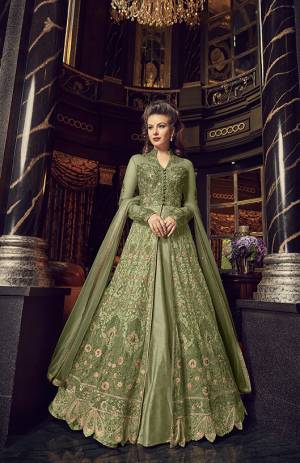 Flaunt Your Rich And Elegant Taste In This Designer Indo-Western Suit In Light Green Color. Its Top And Dupatta Are Net Based With Heavy Embroidery, Available With A Lehenga And Embroidered Pants. Its Lehenga And Pants Are Fabricated On Art Silk. You Can Pair With Any Of Them As Per The Occasion.
