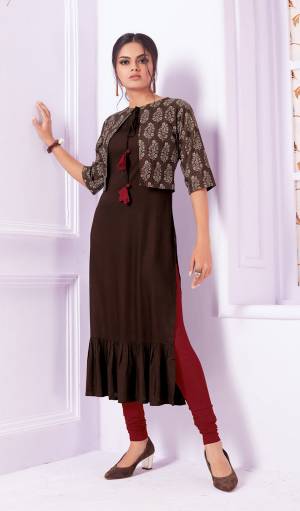 You Will Definitely Earn Lots Of Compliments Wearing This Designer Readymade Kurti In Brown Color Fabricated On Rayon. This Kurti Is Light Weight And Easy To Carry All Day Long. 