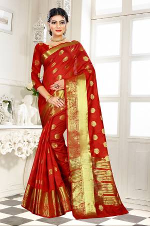Add This Beautiful Silk Based Saree To Your Wardrobe In Red Color Paired With Red Colored Blouse. It Is Beautified With Attractive Butti Weave Over The Saree And Blouse. Buy Now.
