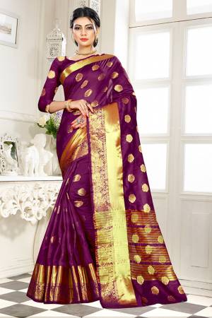 Beat This Heat This Summer Wearing This Pretty Attractive Wine Colored Saree. This Saree And Blouse Are Fabricated On Banarasi Art Silk Beautified With Weave Butti All Over. Also It Is Light In Weight And Easy To Carry All Day Long