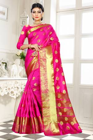 Add This Beautiful Silk Based Saree To Your Wardrobe In Fuschia Pink Color Paired With Fuschia Pink Colored Blouse. It Is Beautified With Attractive Butti Weave Over The Saree And Blouse. Buy Now.