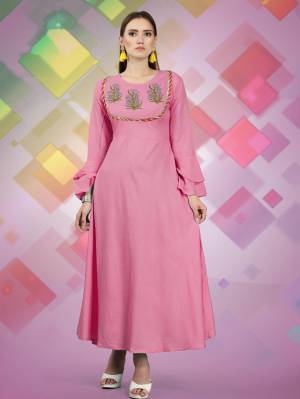 For Your Semi Casuals, Grab This Designer Readymade Kurti In Pink Color Fabricated On Rayon, It Has Attractive Yoke With Prints And Lace Border. Buy Now.