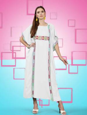 Beautiful Jacket Patterned Designer Readymade Kurti Is Here In White Color Fabricated On Rayon. It Has Pretty Thread Work Over The Yoke Making This Kurti More Attractive, Buy Now.