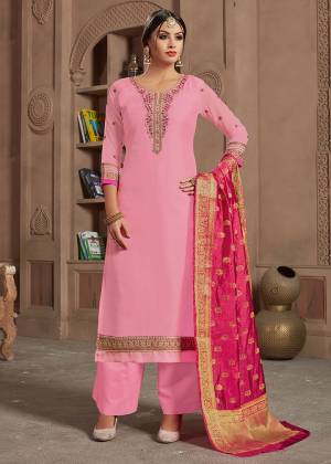 Look Pretty In Shades Of Pink Wearing This Designer Straight Suit In Pink Color Paired With Rani Pink Colored Dupatta, Its Top Is Satin Georgette Based Paired With Santoon Bottom And Banarasi Silk Fabricated Dupatta.