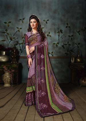 Add Some Casuals With This Pretty Georgette Based Saree Beautified With Prints. It Is Light In Weight As It Is Weightless Fabric Which Also Perfect For Summer. Buy Now.