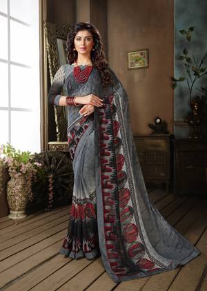 Grab This Beautiful Saree For The Summers. This Saree And Blouse are Georgette Based Beautified With Prints All Over. This Weightless Fabric Is Easy To carry All Day Long. 