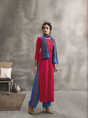 Shine Bright Wearing This Designer Readymade Kurti In Rani Pink Color Paired With Contrasting Blue Colored Plazzo And Scarf. Its Top And Bottom are Rayon Based Paired With Soft Cotton Fabricated Printed Scarf. Buy Now.