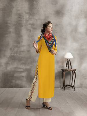 Grab This Rich Looking Designer Readymade Kurti In Yellow Color Paired With Cream Colored Bottom And Multi Colored Scarf. Kurti And Plazzo are Fabricated On Rayon Paired With Soft Cotton Printed Dupatta. All Its Fabrics are Soft Towards Skin And Easy To Carry All Day Long. 