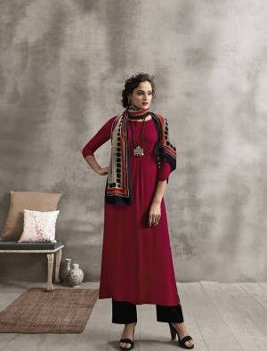 Shine Bright Wearing This Designer Readymade Kurti In Maroon Color Paired With Contrasting Blue Colored Plazzo And Multi Colored Scarf. Its Top And Bottom are Rayon Based Paired With Soft Cotton Fabricated Printed Scarf. Buy Now.