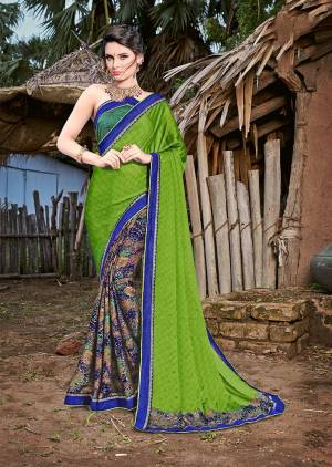 Here Is A Very Pretty For Your Casual Or Semi-Casual Wear. This Saree And Blouse Are Fabricated On Magic Chiffon Beautified With prints And Lace Border. Buy Now.