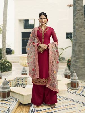 Shine Bright Wearing This Designer Straight Cut Suit In Dark Pink Color Paired With Baby Pink Colored Dupatta. Its Pretty Embroidered Top Is Fabricated On Satin Georgette Paired With Santoon Bottom And Embroidred Tissue Fabricated Dupatta. 