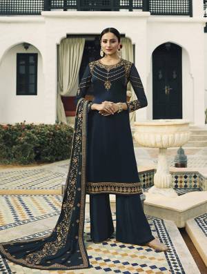 Enhance Your Personality Wearing This Designer Straight Suit In Navy Blue Color. This Heavy Embroidred Suit Is All Occasion Wear, Its Top Is Fabricated On Satin Georgette Paired With Santoon Bottom And Georgette Fabricated Heavy Embroidered Dupatta. 