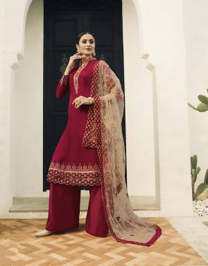 Adorn The Pretty Angelic Look Wearing This Designer Straight Cut Suit In Red Color Paired With Beige Colored Dupatta. Its Top Is Satin Georgette Based Paired With Santoon Bottom And Net Fabricated Dupatta. Its Top And Dupatta Are Beautified With Attractive Embroidery. 