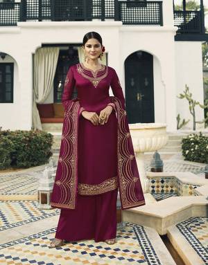 Bright And Visually Appealing Color Is Here With This Designer Straight Cut Suit In Magenta Pink Color Paired With Magenta Pink Colored Bottom And Dupatta. Its Pretty Embroidred Top And Dupatta Are Main Attracts Of This Lovely Suit. 
