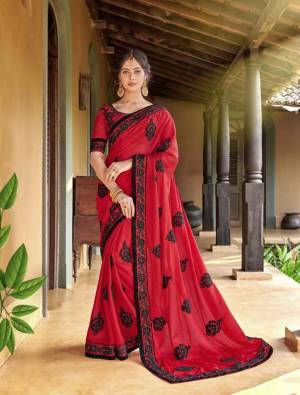 Shine Bright In This Designer Red Colored Saree Paired With Red Colored Blouse. This Saree Is Georgette Based Paired With Are Silk Fabricated Blouse Beautified With Contrasting Thread Embroidery And Stone Work