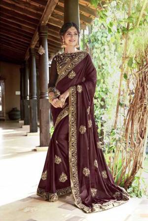 Look Beautiful Wearing This Designer Saree In Wine Color Paired With Wine Colored Blouse. This Saree Is Fabricated On Georgette Paired With Art Silk Fabricated Blouse. It Is Easy To Drape, Durable And Easy To Care Fo