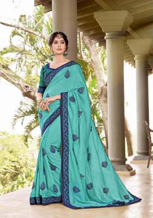 Celebrate This Festive Season Wearing This Designer Silk Based Saree In Turqoise Blue Color Paired With Turquoise Blue Colored Blouse. This Saree Is Georgette Based Beautified With Thread Embroidery And Stone Work?