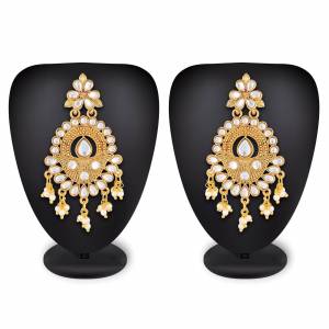 For Your Heavy Traditionals, Grab This Beautiful And Attractive Looking Earrings Set In Golden Color Beautified With Stone Work. This Can Also Be Paired With Any Colored Attire.