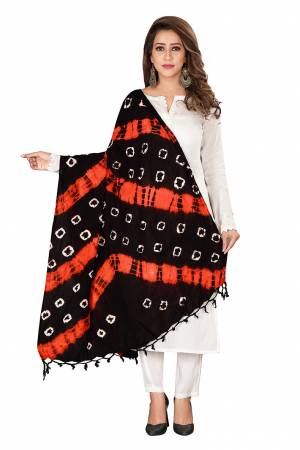 Here Is A Very Pretty Dupatta Perfect For Summers. This Pretty Dupatta Is Cotton Based Beautified With Bandhani Prints All Over It. Pait This Up With Any Same Or Contrasting Colored Kurti. 