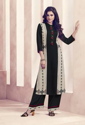 For A Bold And Beautiful OR Formal Look, Grab This Designer Readymade Kurti And Plazzo Set In Black And Cream Color Fabricated On Rayon. Both Its Top And Bottom Are Beautified With Prints And Available In All Regular Sizes. 