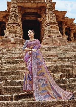 Go Colorful With This Designer Printed Saree In Mutli Color Paired With Multi Colored Blouse. This Saree And Blouse are Fabricated On Khadi Silk Beautified With Prints. 