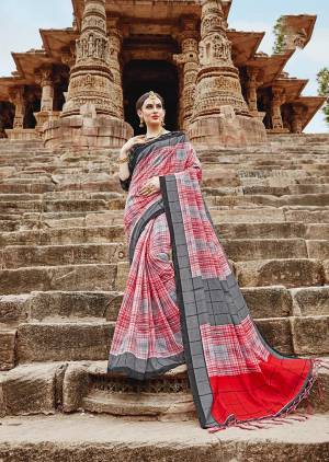 Grab This Beautiful Checkerd Saree In Red And Grey Color Paired With Black Colored Blouse. This Saree And Blouse Are Fabricated On Khadi Silk Beautified With Checks Prints All Over It. 