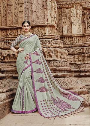 This Season Is About Subtle Shades And Pastel Play, So Grab This Designer Saree In Pastel Green Color Paired With Pastel Green Colored Blouse. This Satee And Blouse Are Fabricated On Khadi Silk Beautified With Prints. 