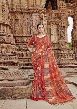 For Your Semi-Casuals. Grab This Beautiful Saree In Rust Paired With Rust Colored Blouse. This Saree And Blouse Are Fabricated On Khadi Silk Beautified Prints. It Is Light In Weight And Easy To Carry All Day Long. 