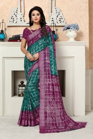 Grab This Beautiful And Attractive Bandhani Printed Saree In Teal Green & Purple Color Paired With Purple Colored Blouse. This Saree Is Fabricated On Georgette Paired With Art Silk Fabricated Blouse. Buy Now.