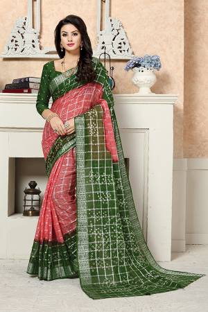 You Will Definitely Earn Lots of Compliments Wearing This Designer Bandhani Printed Saree In Peach And Dark Green Color Paired With Dark Green Colored Blouse. This Saree Is Georgette Based Paired With Art Silk Fabricated Blouse. 