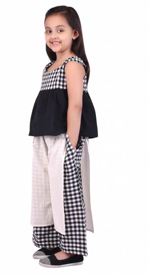 Pretty Simple Pair In Top And Pant Is Here With In Black And White Color . This Pair Is Khadi Cotton Based Which Is Suitable For All Season And Ensures Superb Comfort. Buy Now