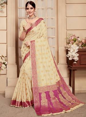 Get Ready For The Upcoming Festive And Wedding Season With This Silk Based Saree In Cream Color. This Saree And Blouse are Banarasi Art Silk Fabricated Beautified With Attractive Weave All Over. Buy Now.