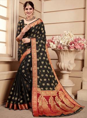 Celebrate This Festive Season Wearing This Saree In Black Color. This Saree And Blouse Are Fabricated On Banarasi Art Silk. Beautified With Weave All Over. Its Attractive Color And Weave Will Earn You Lots Of Compliments From Onlookers. 