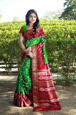Beat This Heat This Summer With This Pretty Cotton Based Saree. This Saree And Blouse Are Fabricated On Art Cotton Beautified With Bandhani Prints All Over. It Is Light Weight And Easy To Carry All Day Long. 