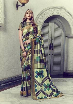 You Will Definitely Earn Lots Of Compliments In This Rich And Elegant Silk Based Saree, This Saree And Blouse are Beautified With Foil Prints Giving It An Attractive Look. 