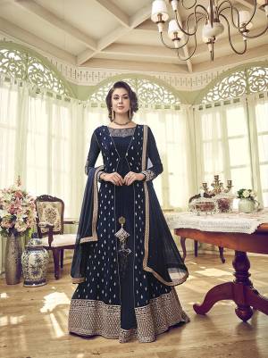 Enhance Your Personality Wearing This Designer Indo-Western Suit In Navy Blue Color. Its Designer Embroidred Top Is Georgette Fabricated Paired With Santoon Bottom And Georgette Fabricated Dupatta. 