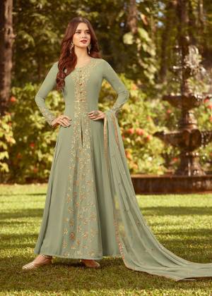Look Pretty In This Designer Floor Length Suit In Pastel Green Colored Top Paired With Pastel Green Colored Bottom And Dupatta. Its Top And Dupatta Are Fabricated On Georgette paired With Santoon Bottom. Buy This Now.