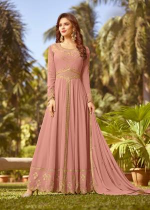 Celebrate This Festive Season With Rich Color And Fabric Wearing This Designer Floor Length Suit In Pink Color. Its Top And Dupatta Are Fabricated On Georgette Paired With Santoon Bottom. Buy Now.