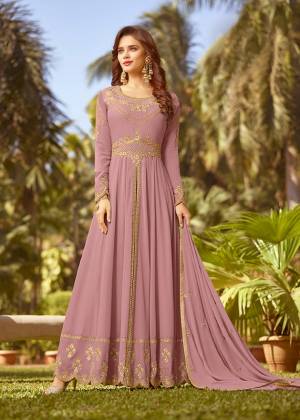 Celebrate This Festive Season With Rich Color And Fabric Wearing This Designer Floor Length Suit In Lilac Color. Its Top And Dupatta Are Fabricated On Georgette Paired With Santoon Bottom. Buy Now.
