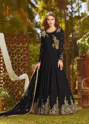 Eye Catchy And Trendy Color Is Here With This Designer Floor Length Suit In Black Color Paired With Black Colored Bottom And Dupatta. Its Top And Dupatta Are Fabricated On Georgette Paired With Santoon Bottom. It Is Beautified With Attractive Embroidery. Buy Now.