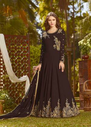Eye Catchy And Trendy Color Is Here With This Designer Floor Length Suit In Brown Color Paired With Brown Colored Bottom And Dupatta. Its Top And Dupatta Are Fabricated On Georgette Paired With Santoon Bottom. It Is Beautified With Attractive Embroidery. Buy Now.