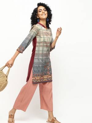 Be It Your College Wear, Daily Wear Or Office Wear. These Trending Short Kurtis Are Suitable For All. This Pretty Kurti Is Fabricated On American Crepe Beautified With Prints And It Is Available In all Regular Sizes. Buy Now.