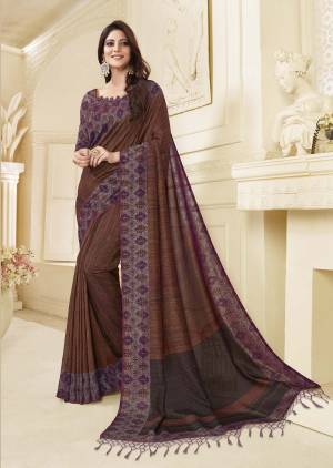 This Festive Season Wear This Rich And elegant Looking Printed Saree In Brown Color Paired With Contrasting Brown Colored Blouse. This Saree And Blouse are Fabricated On Art Silk Beautified With Prints All Over. 