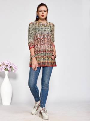 Get These Amazing Printed Tops For This Summer Which can Be Beautifully Paired With Denim Or Pants. This Pretty Top Is Fabricated On Muslin Beautified With Prints All Over. It Is Light In Weight And Easy To Carry All Day Long. 