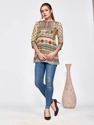 Get These Amazing Printed Tops For This Summer Which can Be Beautifully Paired With Denim Or Pants. This Pretty Top Is Fabricated On Muslin Beautified With Prints All Over. It Is Light In Weight And Easy To Carry All Day Long. 