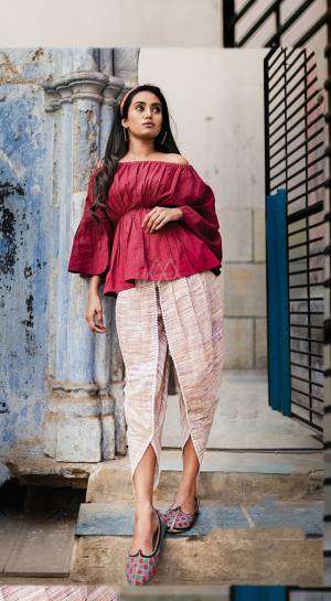 These Summer, Get This Trending Western Pair For Women. Its Top And Bottom Are Fabricated On Khadi Beautified With Prints. Its Unique Pattern And Subtle Color Pallete Will Ean You Lots Of Compliments From Onlookers. 