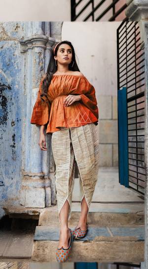 For Your College Wear Or For A Casual Outing, Grab This Designer Readymade Pair Containing Top And Bottom. Its Top And Bottom Are Fabricated On Khadi Which Is Light Weight And Ensures Superb Comfort All Day Long. 