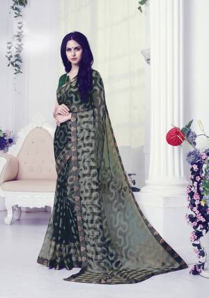 For Your Utmost Comfort, Grab This Pretty Light Weight Saree Fabricated On Georgette Brasso Paired With Art Silk Fabricated Blouse. It Is Beautified With Prints And Lace Border. 